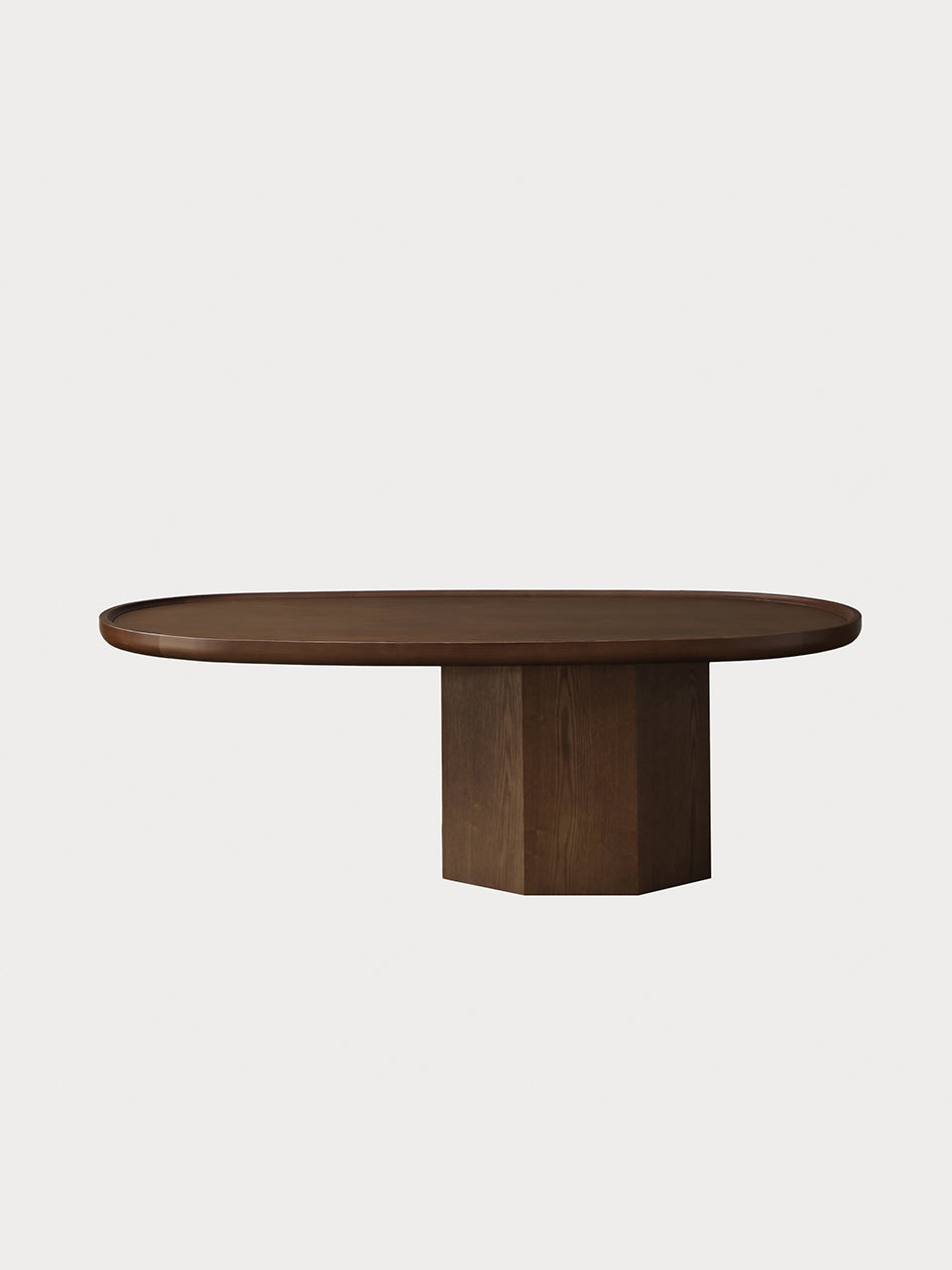Mesa ovalada con pie hexagonal en madera de fresno marrón