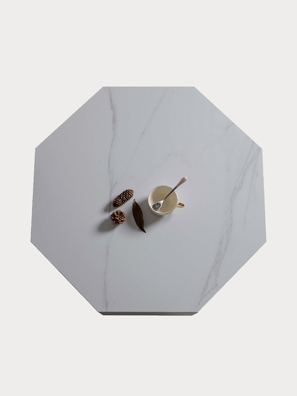 Tablero de mesa de centro de mármol en forma octagonal.