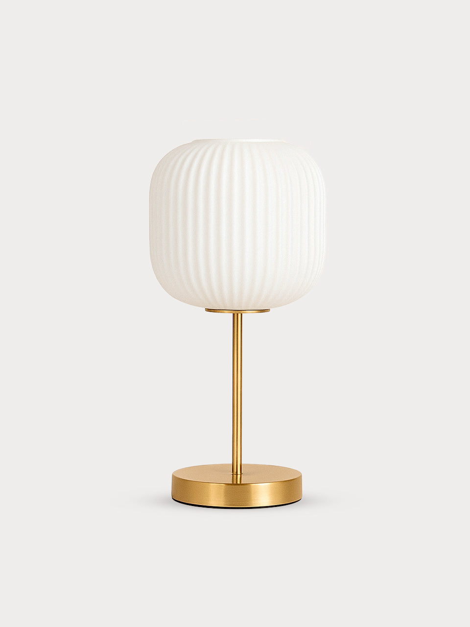 Lámpara de mesa con base dorada y pantalla de cristal, disponible en 2 colores