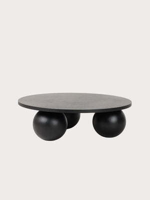 Mesa de centro de diseño con tablero y patas circulares